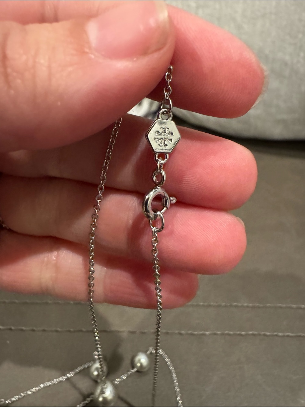 Tory Burch Silver Tone Necklace, Earring and Bracelet Set - Picture 7 of 8